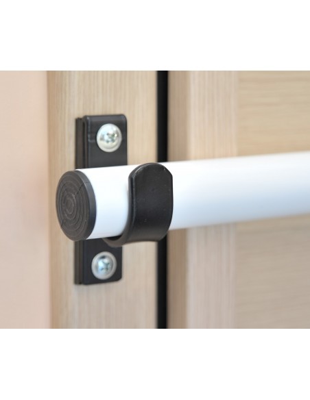 Adjustable safety bar for entry doors of all types