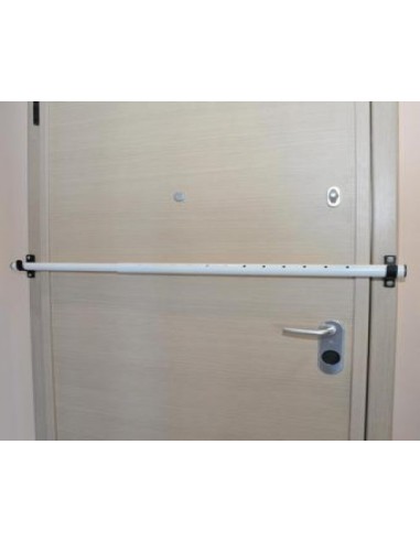 Adjustable safety bar for entry doors of all types